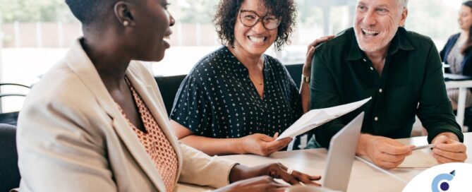 A couple talks with and advisor, representing the type of preparation that is crucial for successful senior care planning.